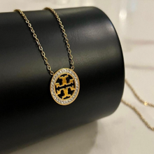 Tory Burch Pendant